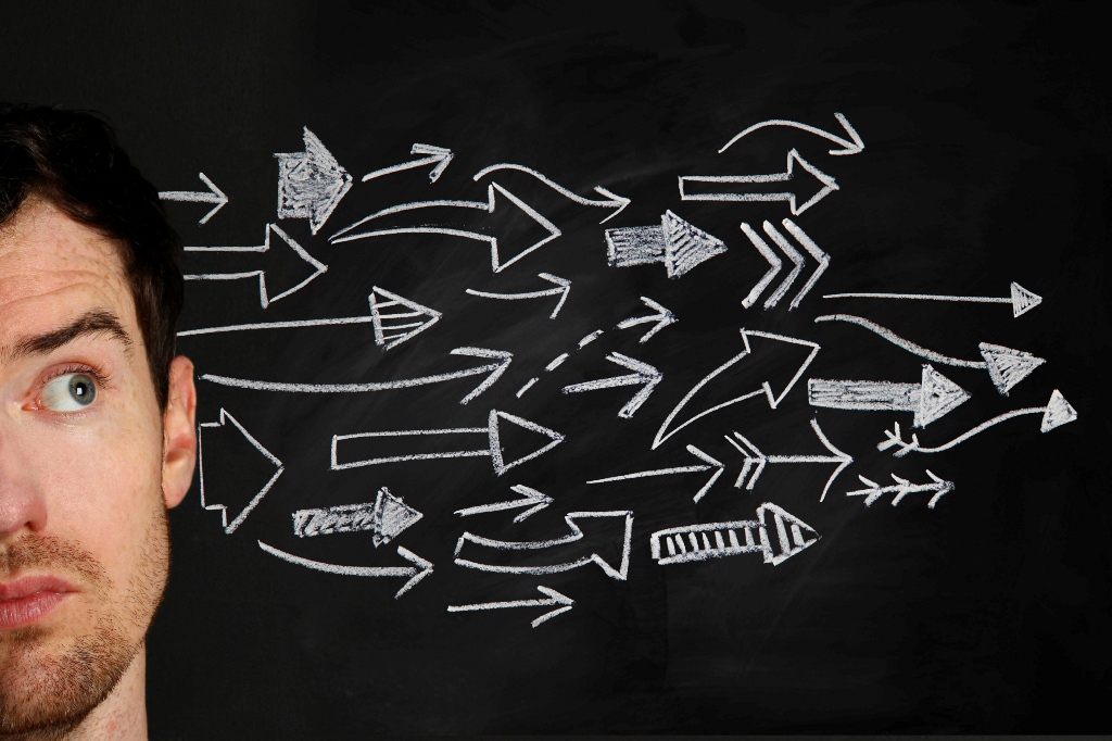 Man following arrows