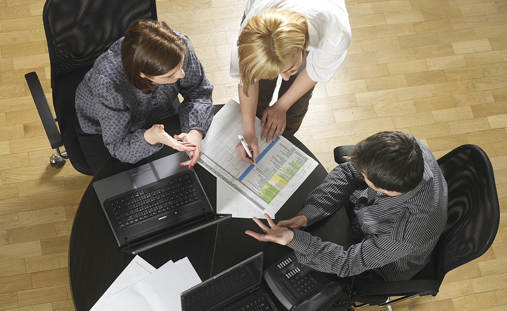 three people meeting